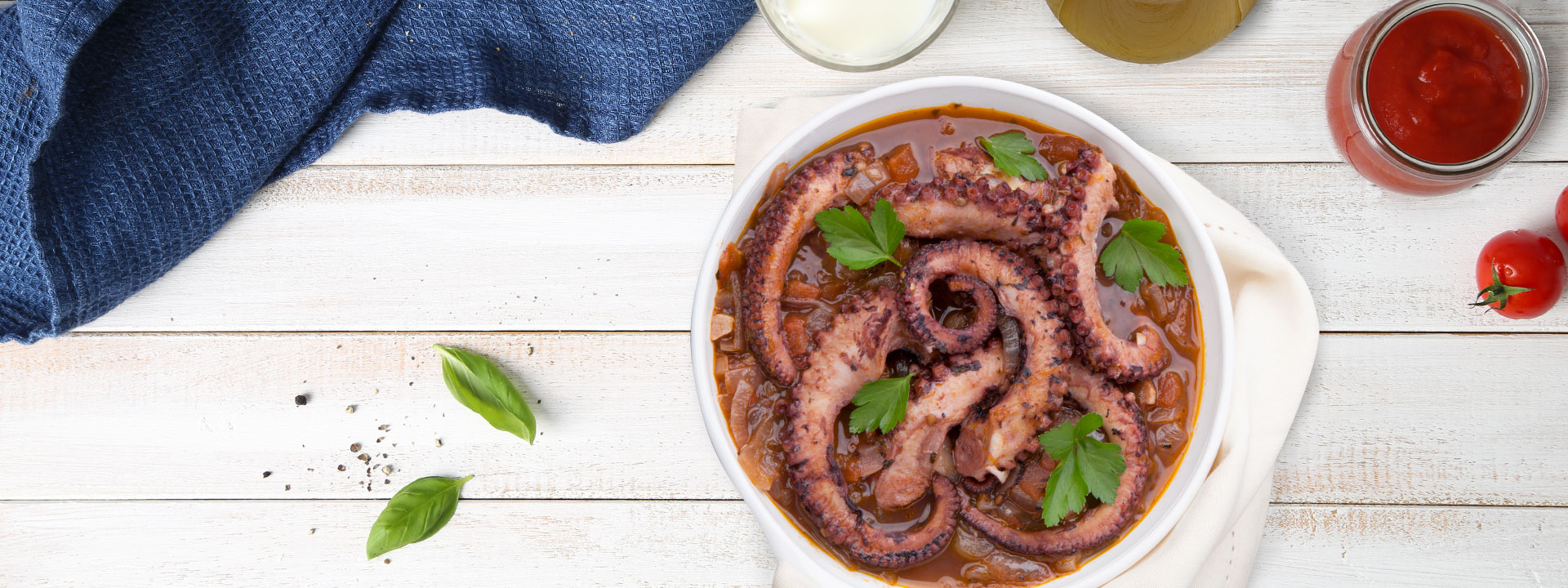 Piatto di agliata all'algherese con polpo e pomodori