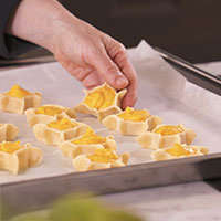 disposizione pardulas su teglia forno per cottura